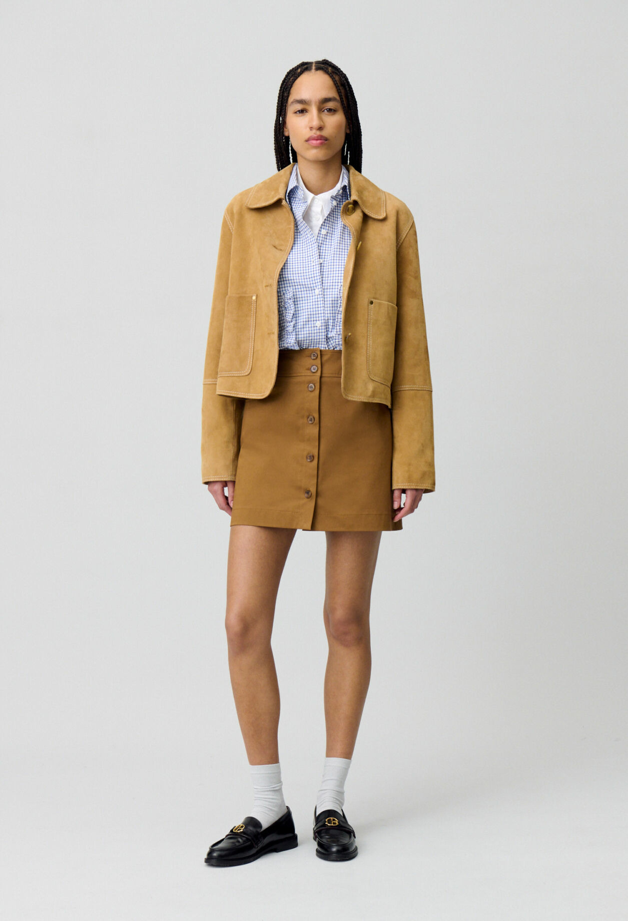 Jupe courte à boutons