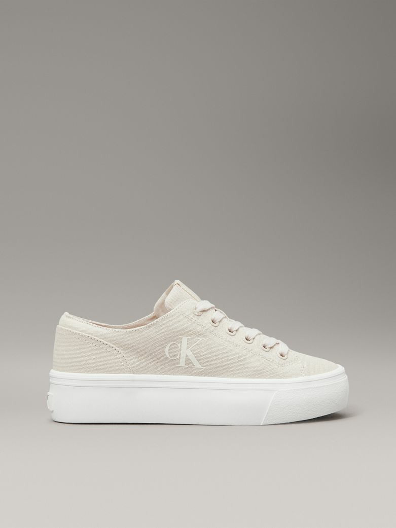 BASKETS BASSES À SEMELLE PLATE VULCANISÉE