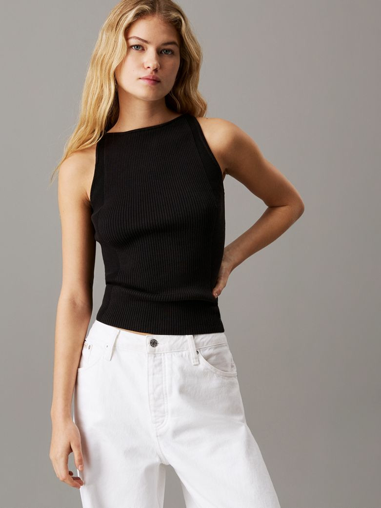 TOP EN MAILLE AVEC ÉTIQUETTE TISSÉE