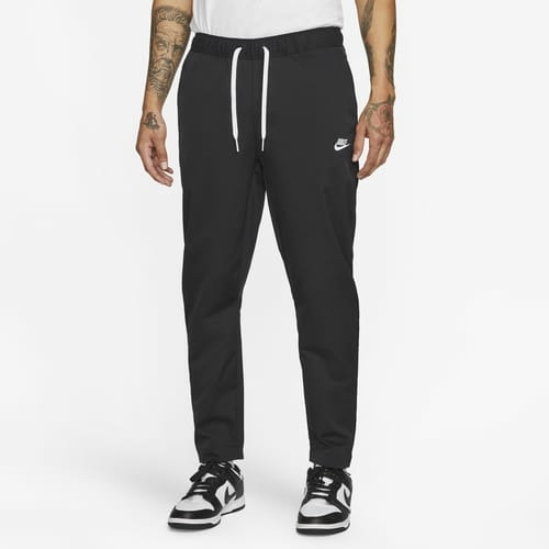 M NK CLUB WVN TAPER LEG PANT