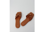Mules en cuir ornées de studs