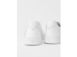 Baskets en cuir blanc à studs